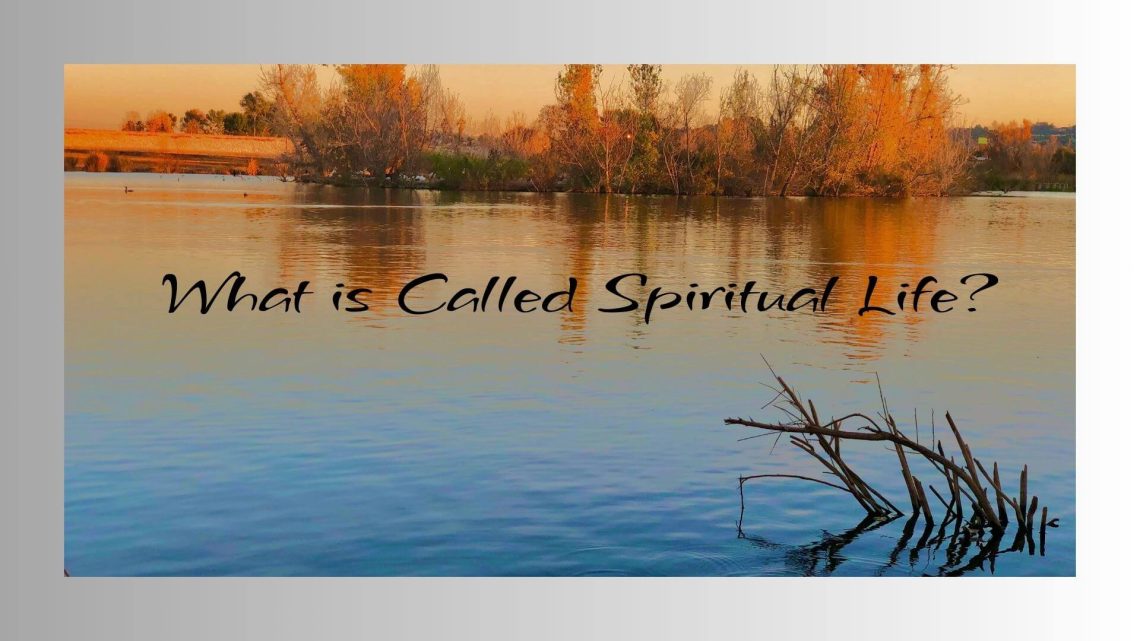 A calm river reflects golden autumn trees under a soft evening sky, with a branch resting in the water. The text overlay reads, “What is Called Spiritual Life?”